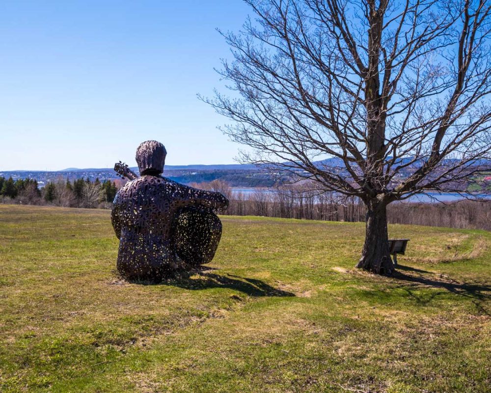 Art displays overlooking the St. Lawrence River on ile d'Orleans