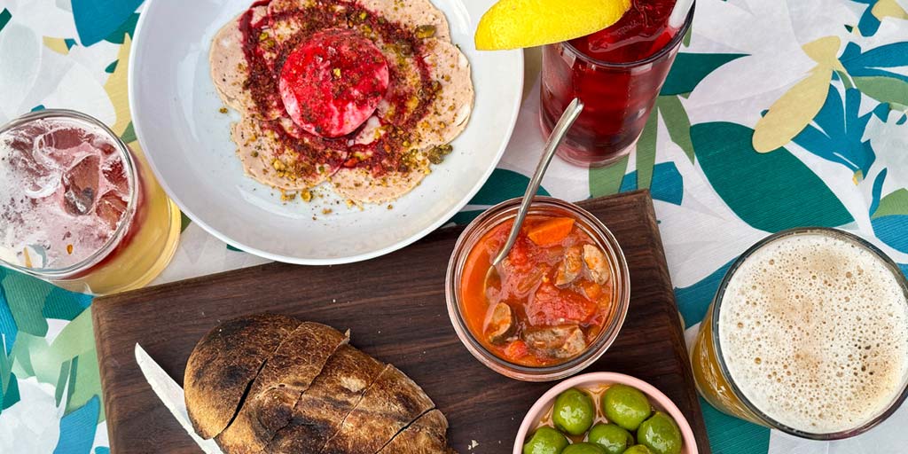 A table overflowing with delicious-looking food among the best restaurants in Saskatoon