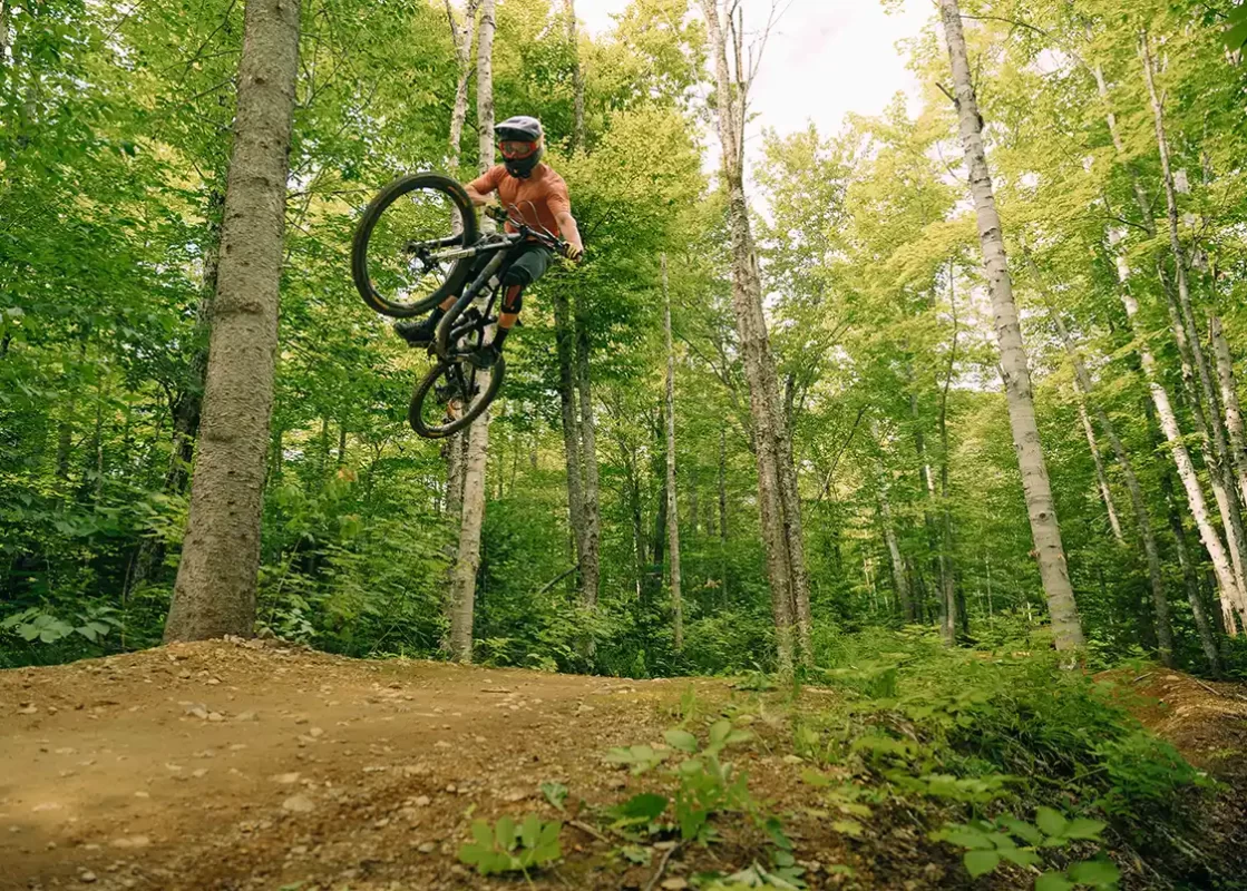 Mountain Bike rider getting big air at Sugarloaf in Campbellton New Brunswick
