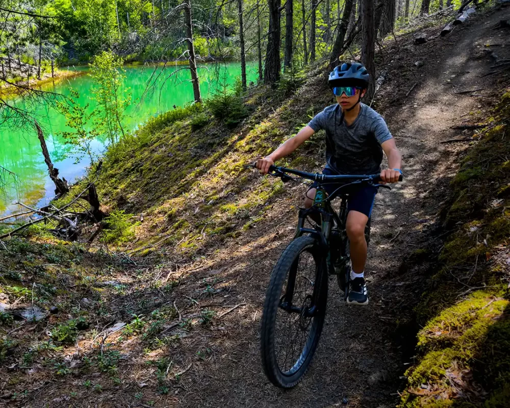 Teenager mountain biking in Minto New Brunswick