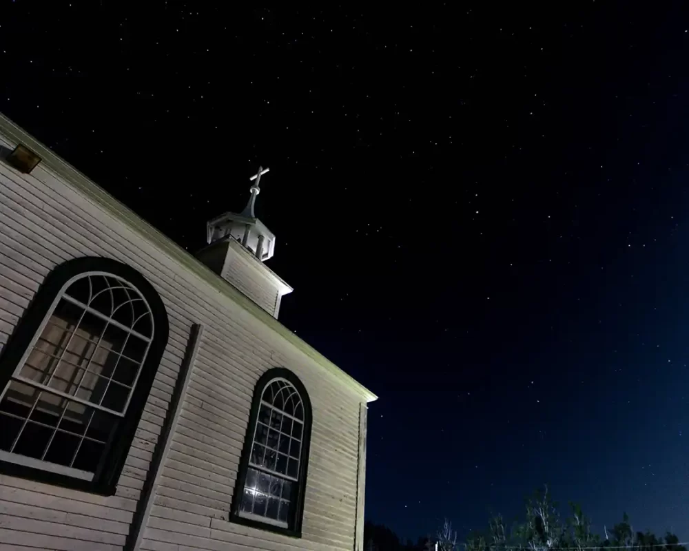 Night skies over Chappelle Sainte-Anne de Beaumont near Moncton New Brunswick